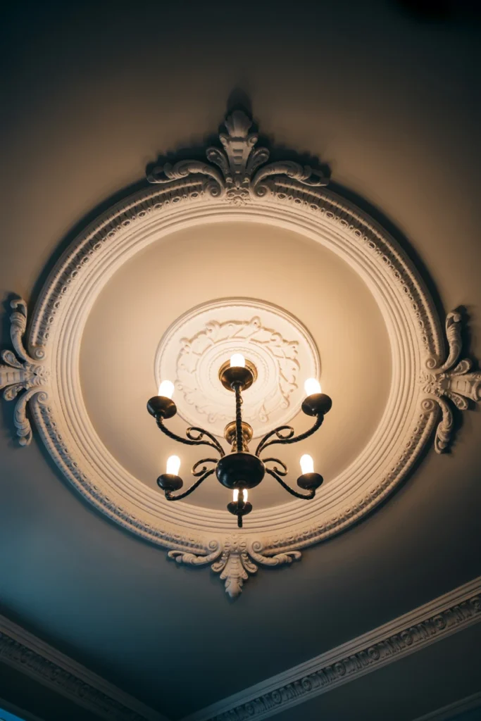 Anchor a ceiling medallion above the primary light fixture