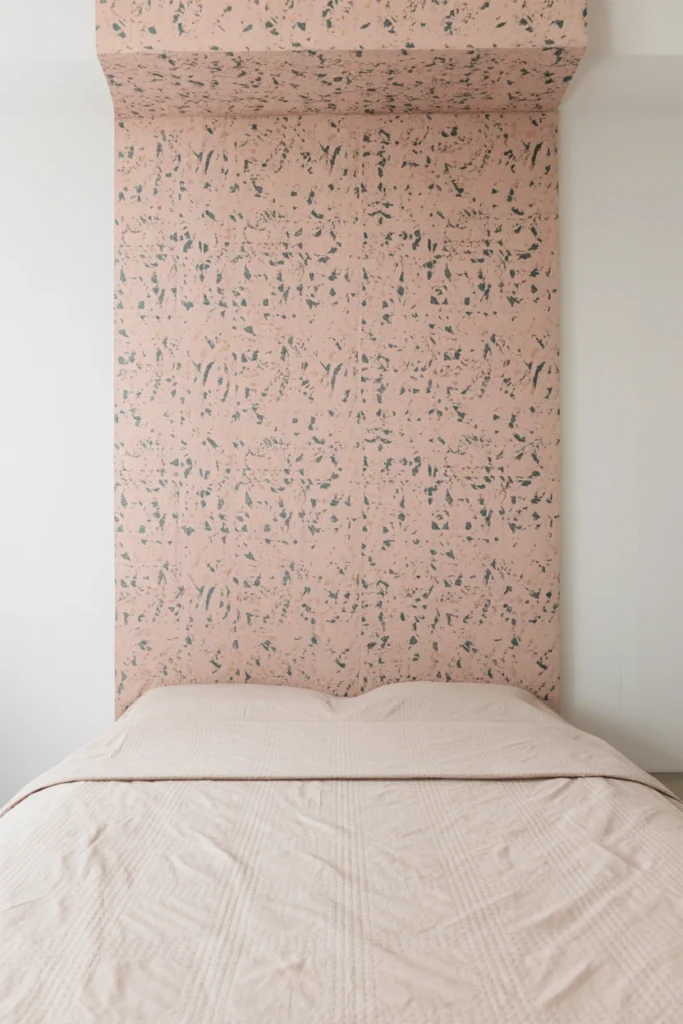 Removable Memphis-pattern wallpaper panel installed behind a bed headboard
