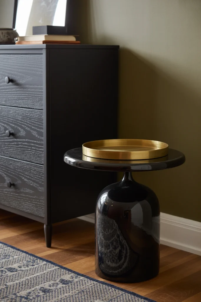 Mix matte and glossy black finishes across furniture