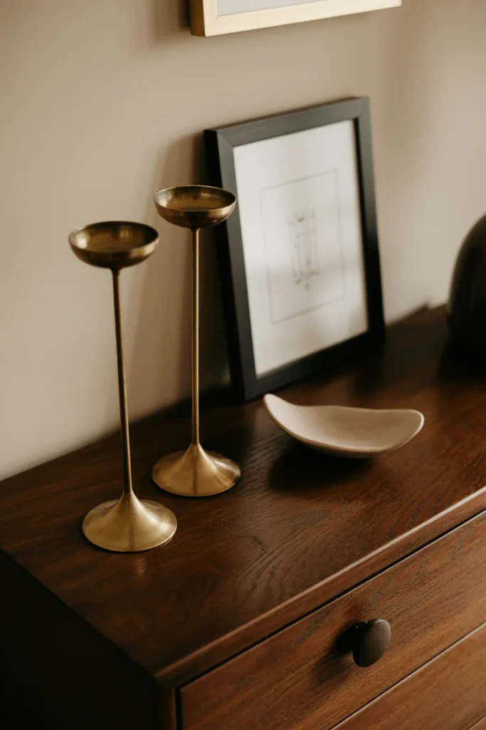 Arrange a vignette of 3-5 objects on every flat surface