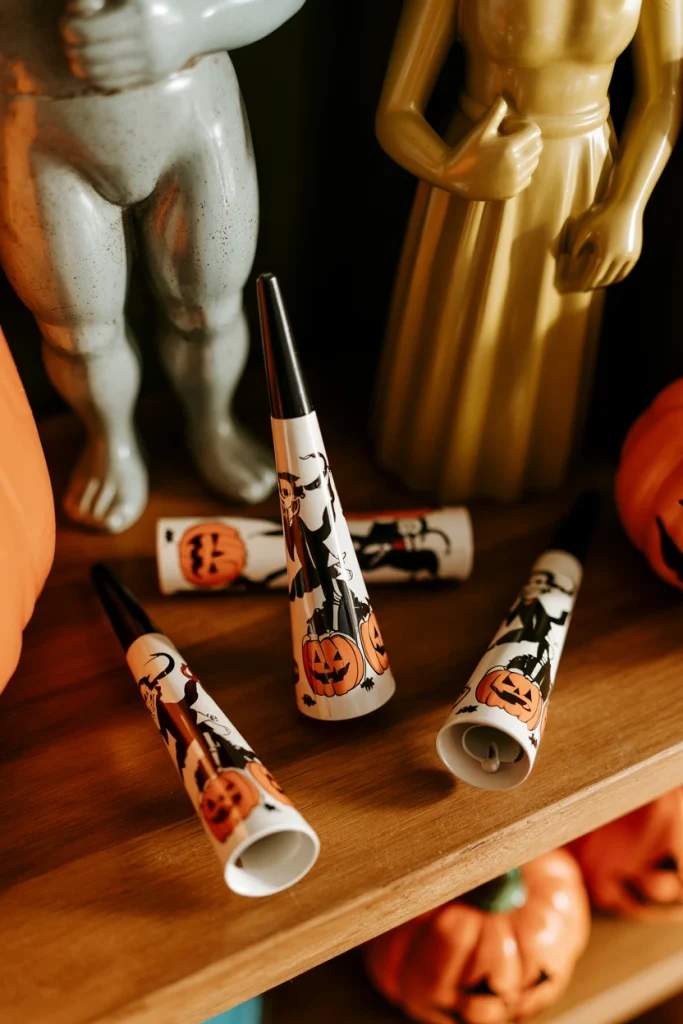 Layer In Tin Litho Noisemakers as Accent Pieces
